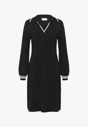Mustmustriibuline must pika varrukaga kootud kleit, millel on valged triibud kaeluses ja mansettides, V-kaelus ja kergelt laienev siluett.