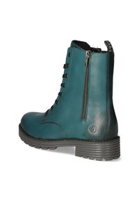 Türkisfarbene Leder-Stiefelette mit schwarzen Schnürsenkeln, seitlichem Reißverschluss, strukturiertem Absatz und genähten Details. Runde Zehenform und Logoemblem an der Ferse.