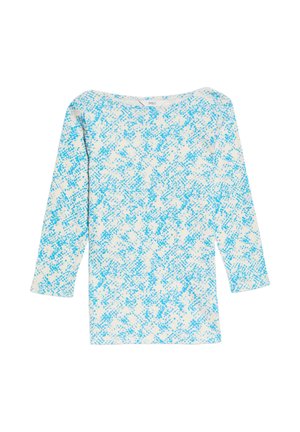 Bílá košile s dlouhým rukávem s modrým abstraktním vzorem rozptýlených teček a kulatým výstřihem, položena na bílém pozadí.