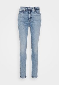 Högmidjade skinny jeans i ljusblå denim med subtil blekning, med en sydd midja, fem fickor och minimal hårdvara.