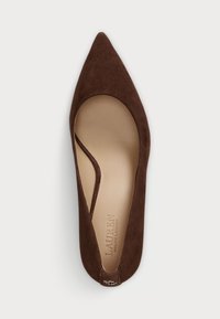 Brown suede pointed-toe flat shoe with a deep cutout design. Features a cream interior and logo detail on the sole. Smooth texture throughout.