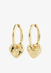 Seleccionado, gold coloured