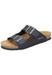 Black slide sandal with two adjustable straps, metallic buckles, cork footbed, and rubber outsole. Textured upper surface for grip.