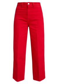Pantaloni a vita alta larghi di colore rosso brillante con bottone frontale e passanti per cintura, realizzati in tessuto solido, esposti su uno sfondo bianco.
