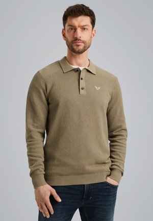 Textured olive green pullover with a collared neckline, three black buttons, and a logo on the chest. Pairing with dark blue jeans.