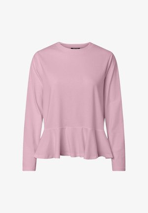 Majica dugih rukava svijetloružičaste boje s detaljem pepluma na rubu, izrađena od mekanog materijala. Ima jednostavan okrugli izrez i ležeran kroj.