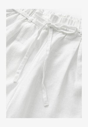 Pantaloni bianchi in lino con vita elastica e coulisse abbinata, realizzati in un tessuto morbido e strutturato per comfort e traspirabilità.