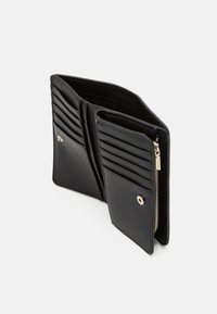 Black leather wallet with zippered compartment and multiple card slots. Features gold-toned hardware and a sleek, minimalist design.
