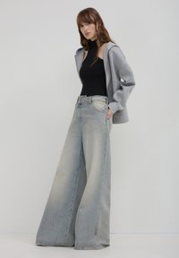 Calliope EFFETTO SABBIATO  - Jean flare - blu