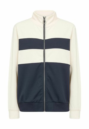 Veste zippée avec un col montant, en tissu lisse avec des rayures horizontales blanches et bleu marine. Poignets et base côtelés pour une coupe ajustée.