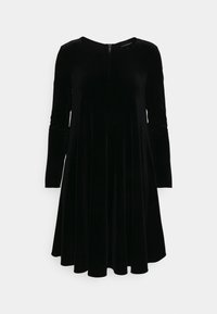 Zwart fluwelen jurk met lange mouwen, ronde hals en een rits aan de achterkant. Flare ontwerp met een gladde textuur en hoogte boven de knie.