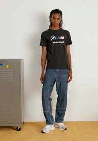 Puma LOGO TEE - Triko s potiskem - puma black