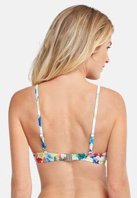 Färgglad bikiniöverdel med blommönster i blått, grönt och rött. Justerbara remmar med hakstängning på baksidan.