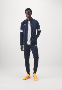 Puma INDIVIDUALRISE SET niebieski