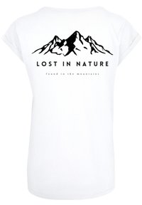 White T-shirt with a rounded neckline and short sleeves. Features a black mountain graphic and text "LOST IN NATURE" above "found in the mountains."