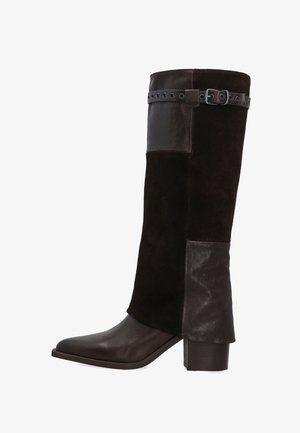 - Kowbojki i obuwie motocyklowe