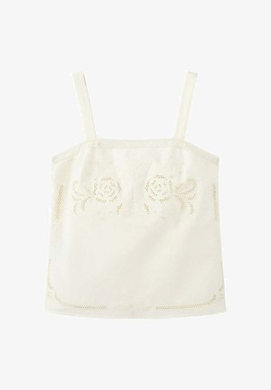 Haut sans manches de couleur crème avec fines bretelles, orné de motifs floraux brodés et de découpes à l'avant et sur les bords.