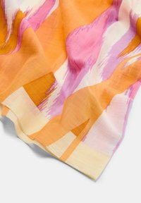 Multicolored fabric with large shapes in orange, pink, and cream. Soft texture with abstract patterns and a slight sheen. Lightweight material.