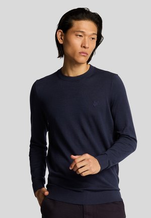 Maglione crewneck blu navy realizzato in tessuto testurizzato, con polsini e orlo a coste, caratterizzato da un piccolo logo ricamato sul petto.