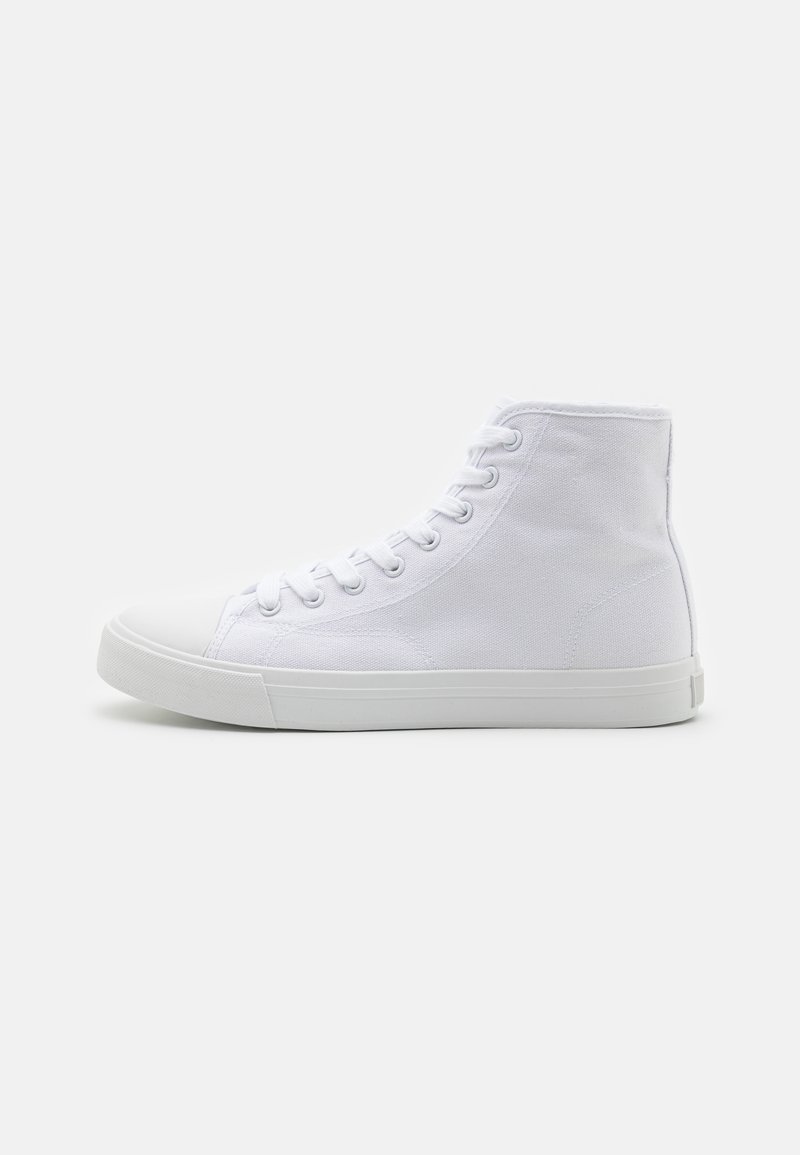 White canvas high-top sneakers with a rubber sole, laced design, and smooth texture. Features a rounded toe and a supportive ankle height.