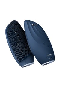 Mörkblå hårborste med ergonomisk design, texturerade borstar på ena sidan, slät yta på den andra, med kontrollknappar och LED-indikatorer.