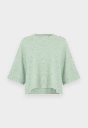 Light green, loose-fitting sweater with short sleeves, round neckline, and a slightly cropped hem. Soft texture and smooth finish.