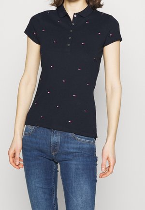 Marine polo shirt met korte mouwen, voorzien van kleine rode en witte geborduurde accenten, vijfknops placket en een getailleerd design.