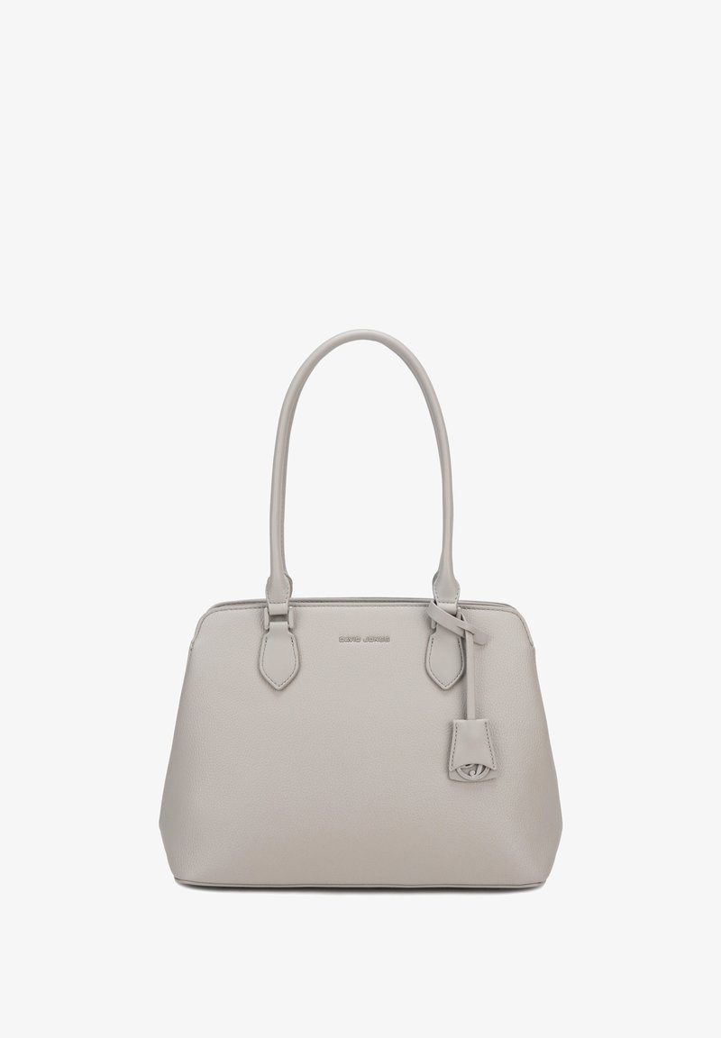 Sac à main en cuir gris clair avec double poignée, un petit accessoire suspendu et un logo de marque discret au centre avant.