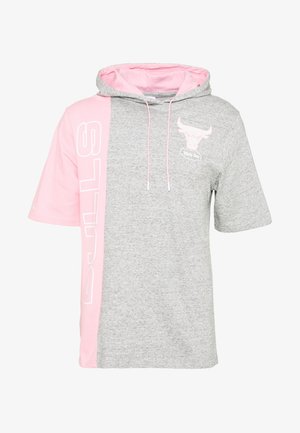 Gray short-sleeve hoodie with pink panel. Features logo and text on the side, adjustable drawstring hood, and soft fabric texture.