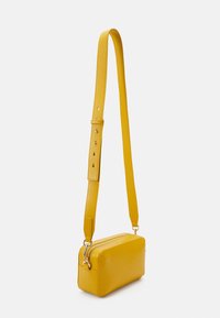 Tommy Hilfiger CHIC CAMERA BAG - Olkalaukku - city yellow
