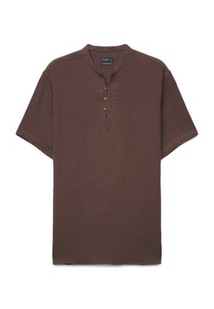 Brown short-sleeve textured shirt with a band collar and three wooden buttons on the placket.