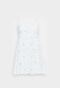 Vit klänning med tunna axelremmar, V-ringning och blommönster i blått och svart. Flödande, knälång, lätt tyg.