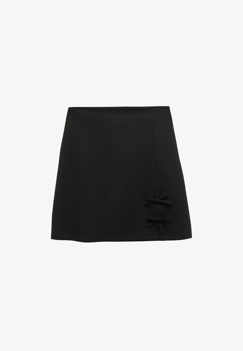 Black mini skirt made of smooth fabric, featuring a fitted waist and two bow accents on the right side. Clean lines and minimal design.