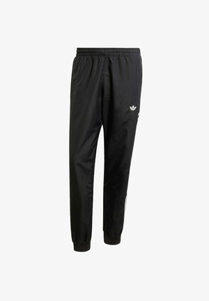 Pantalones deportivos negros de Adidas con cintura y puños elásticos, con el logo blanco de Adidas en el muslo y tres rayas blancas a lo largo del lateral.