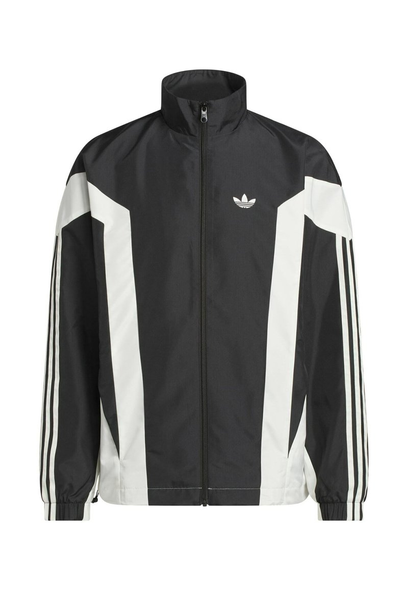 Schwarze und weiße Zip-Jacke aus leichtem Stoff, mit hohem Kragen, eckigen Farbblöcken und drei Streifen an jedem Ärmel.