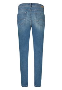 Modré denimové džíny s přiléhavým střihem, středně vysokým pasem, dvěma zadními kapsami a jemným vyblednutím. Mají standardní zakončení spodního lemu.