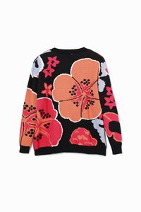 Maglione lavorato a maglia con ampi motivi floreali colorati su uno sfondo nero. Prevalentemente tonalità di rosa, rosso e blu.