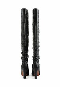 Black leather knee-high boots with a slouchy design, pointed toe, and a tapered high heel. Smooth texture with minimal detailing.
