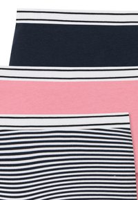 Baumwollmix Leggings in Marineblau, Pink und gestreiften Mustern. Sie verfügen über eine weiche Textur und verschiedene Designs mit kontrastierenden weißen Streifen.