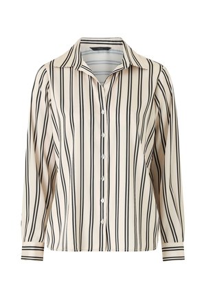 Beige blouse met lange mouwen en zwarte verticale strepen, knoopsluiting aan de voorkant en puntkraag, weergegeven op een witte achtergrond.