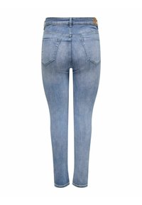 Vaaleansiniset farkkutrikoot, joissa on tiukka leikkaus, kaksi takataskua ja minimimäärä ommelty yksityiskohtia. Sileä pinta, tavanomainen vyötärö.