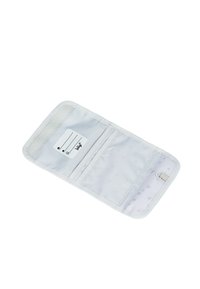 Wallet with a white fabric exterior and a smooth texture. Interior features multiple slots and a keyring attachment in a light pattern.