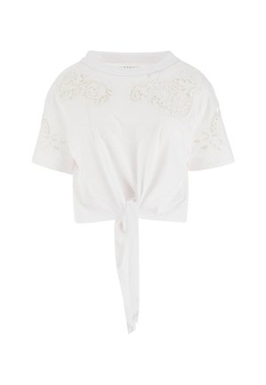 Hvid cropped t-shirt lavet af blødt stof med blonder på skuldrene og en knude foran. Korte ærmer.