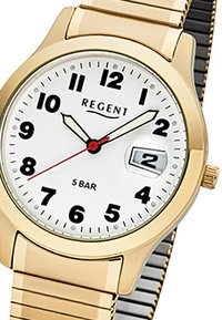 Montre-bracelet en or avec un cadran blanc, des chiffres arabes noirs, une aiguille des secondes rouge, un guichet de date et un bracelet en maillons métalliques. Étanche jusqu'à 5 bars.