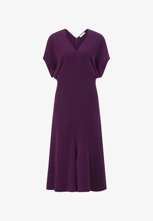 Robe col en V de couleur violet profond. Manches courtes avec une coupe ample et un ourlet évasé. Texture lisse, coupe mi-longue, et fermeture éclair au dos.