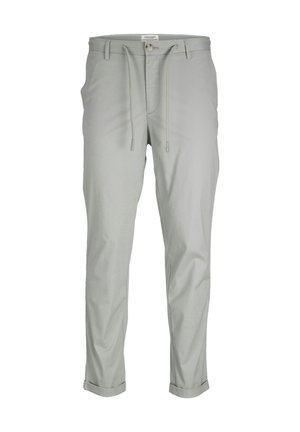 Pantalones gris claro con un diseño ajustado, hechos de una tela suave. Cuentan con cintura elástica con cordón, bolsillos frontales y puños enrollados.