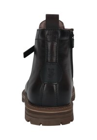 Bottine en cuir marron avec une finition texturée, une languette arrière et une fermeture éclair sur le côté. Elle est dotée d'une semelle en caoutchouc durable avec des crampons prononcés.