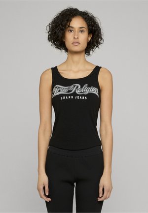 Débardeur noir à encolure dégagée, avec une inscription argentée en script "True Religion Brand Jeans" sur la poitrine. Tissu lisse, coupe ajustée.
