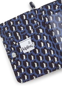 Kipling wallet in blue with a geometric black and white pattern, featuring a snap button closure and RFID safe technology.
