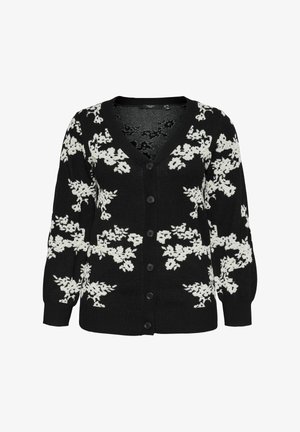 Cardigan noir avec motif floral blanc, en V, boutons sur le devant, et manches longues avec des poignets côtelés. Texture douce et coupe décontractée.